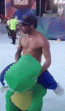 Dinosaur spotted at music festival absolutely killing it….gif