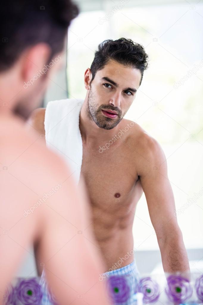 depositphotos_98102944-stock-photo-handsome-man-looking-in-mirror.jpg